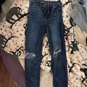 High waisted dark wash ripped jeans